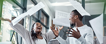 couple celebrating cash-out refinance