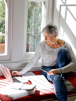 woman researching real estate agents