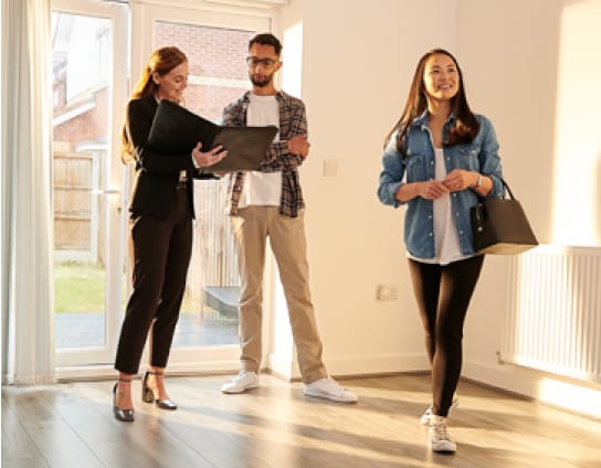 Homebuyers and Realtor Finding a Starter Home