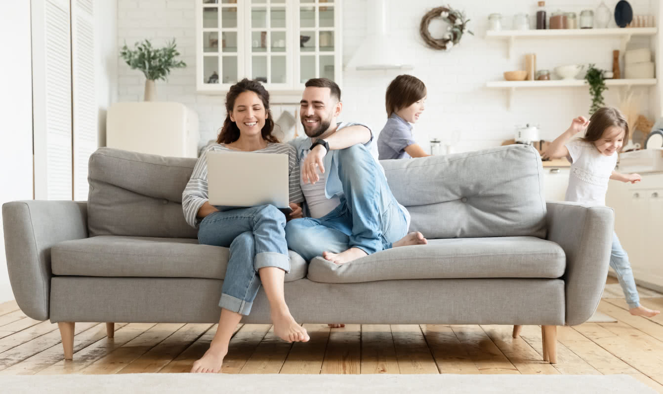 family reviewing loan offers in living