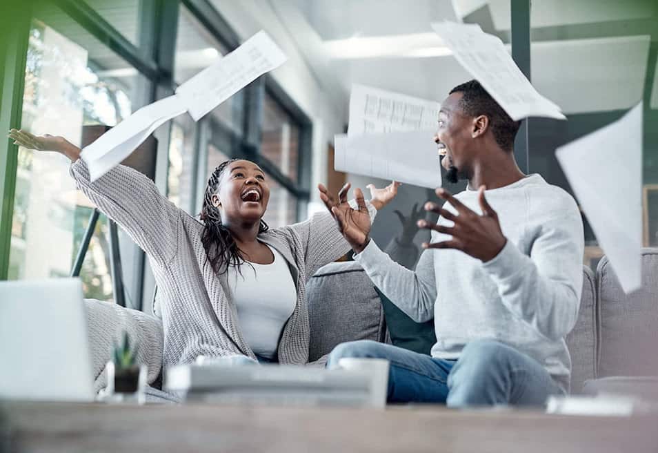 man and woman celebrating graduation