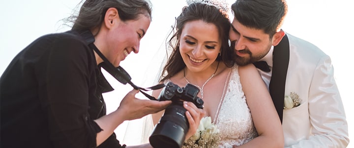 couple reviewing wedding photography