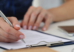 person using checklist for personal assets