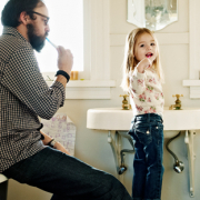 man and daughter getting ready