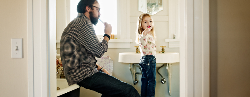 man and daughter getting ready