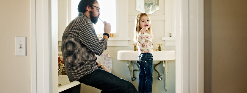 Man and daughter preparing to reduce debt-to-income ratio