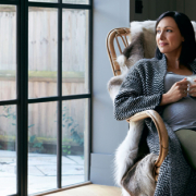 woman thinking about mortgage refinance options