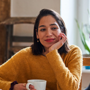 woman talking with realtor about making an offer on a home