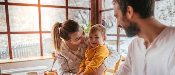 Family celebrating moving into their new home