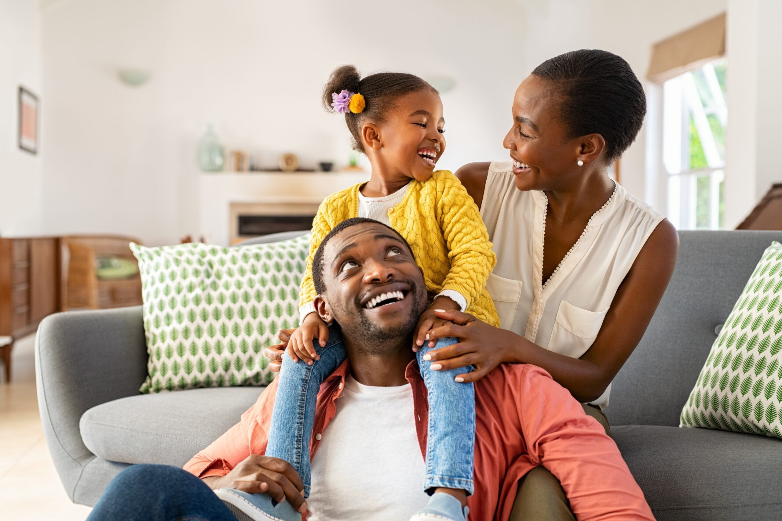 happy family living at home after refinancing a second mortgage